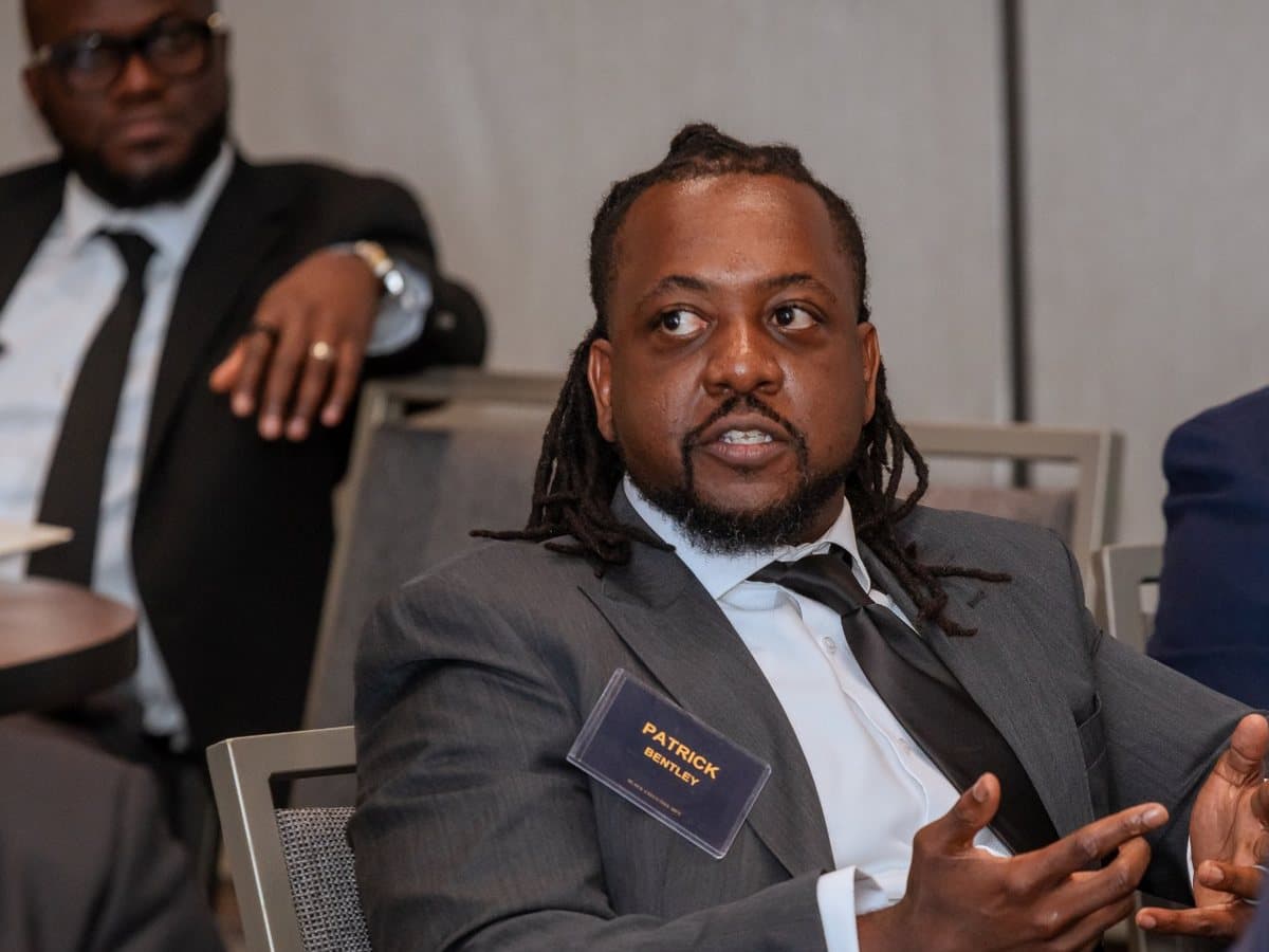 A member making a point at a BEM roundtable as others listen
